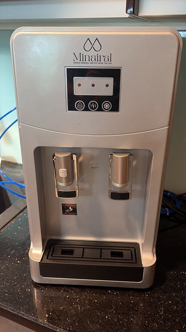 Front of the unit: control panel and two taps